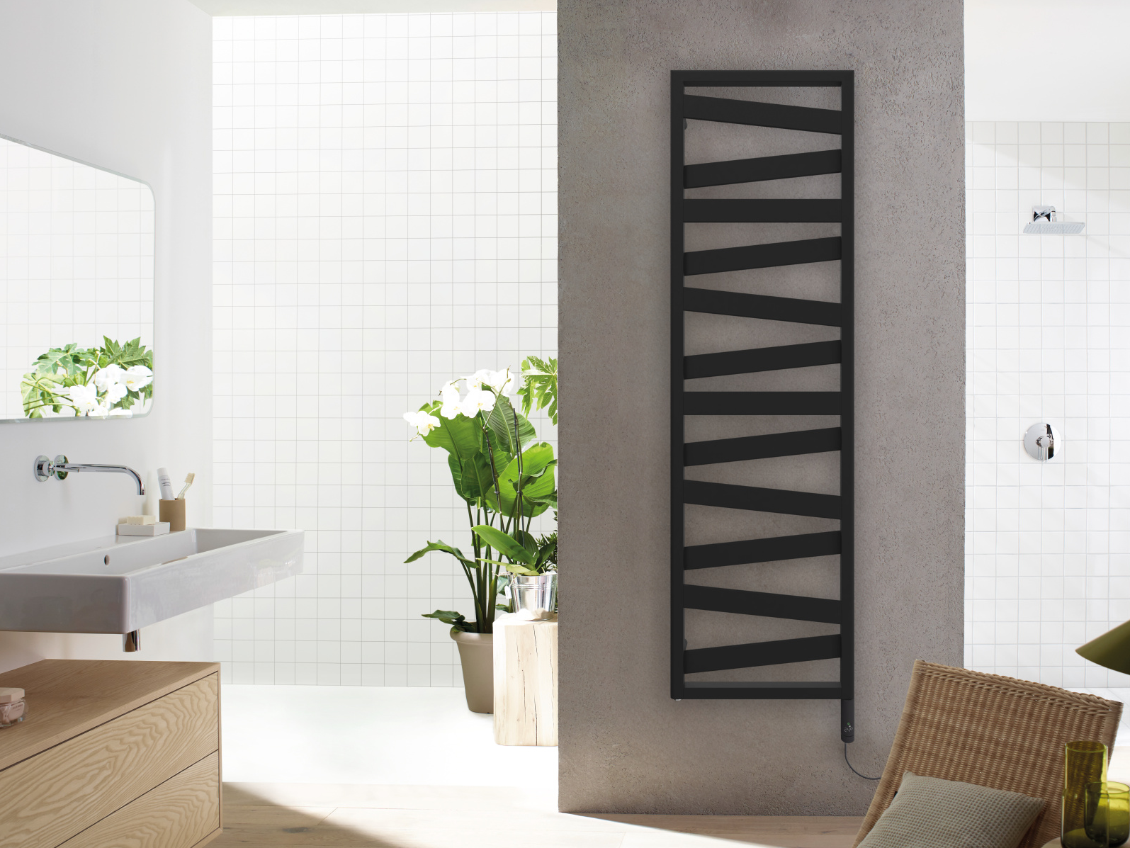 Zehnder_RAD_Ribbon-EL_180-055_IHC_BlackMatt_bathroom-withChair Rendering Zehnder Ribbon Decorative radiator Front view